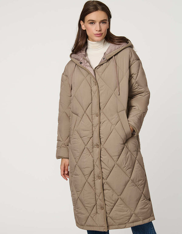 Oversized long puffer coat with diamond quilting, corduroy trim, hood, welt pockets, and Ecoplume insulation.