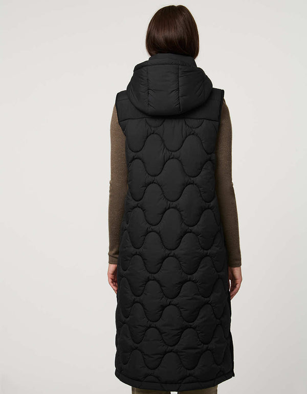 fashionable womans trendy puffer vest in black for winter season in a walker length with oversized fit for comfort