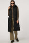 fashionable womans trendy puffer vest in black for winter season in a walker length with oversized fit for comfort