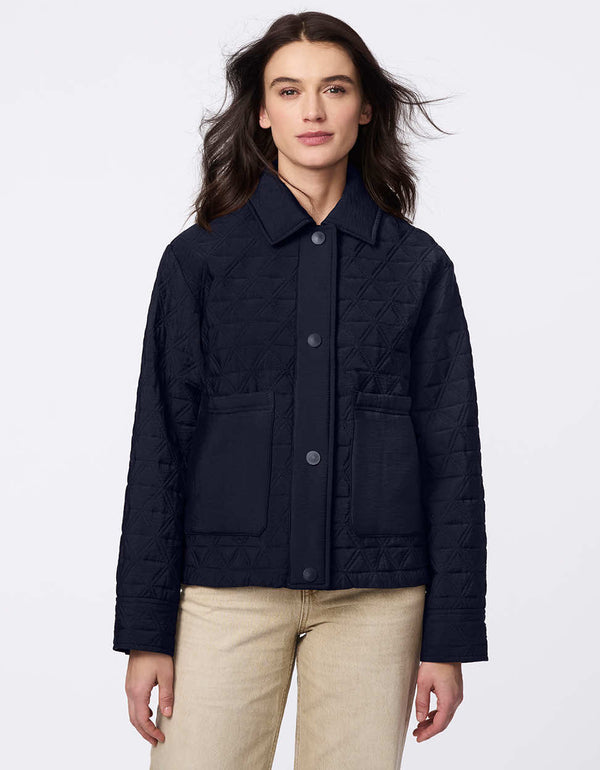 Lightweight and endlessly versatile, the Skyline Quilted Jacket blends classic quilting with modern utility. Oversized patch pockets add a stylish touch, while the adjustable drawstring hem lets you tailor the shape—wear it relaxed and straight or cinch it for a bubble effect. A snap-front closure ensures layering is effortless, making this the perfect transitional piece to complement any outfit from day to night.