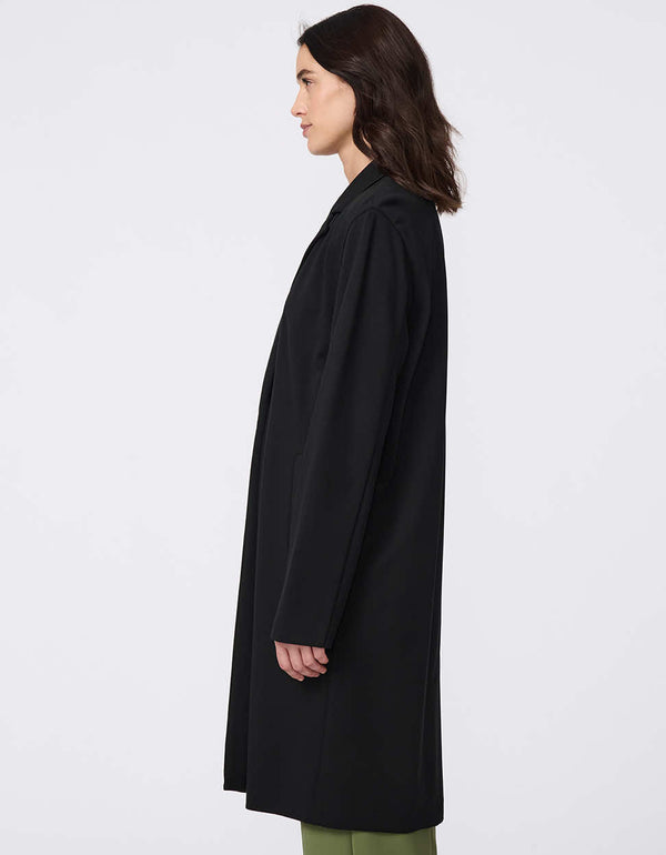 Effortless Traveler Long Jacket, a lightweight, single-button duster coat with a sleek lapel and streamlined silhouette for everyday elegance.