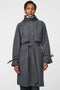 Calf-length women’s trench coat with belt, adjustable cuffs, and packable hood, ideal for transitional weather.