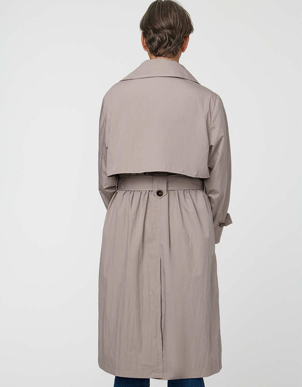 Arden Trench Coat with funnel collar and asymmetrical front in a soft cotton blend.