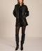 Women's black genuine leather bomber jacket with zip-front closure, stand collar and rib-knit trim