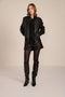 Women's black genuine leather bomber jacket with zip-front closure, stand collar and rib-knit trim