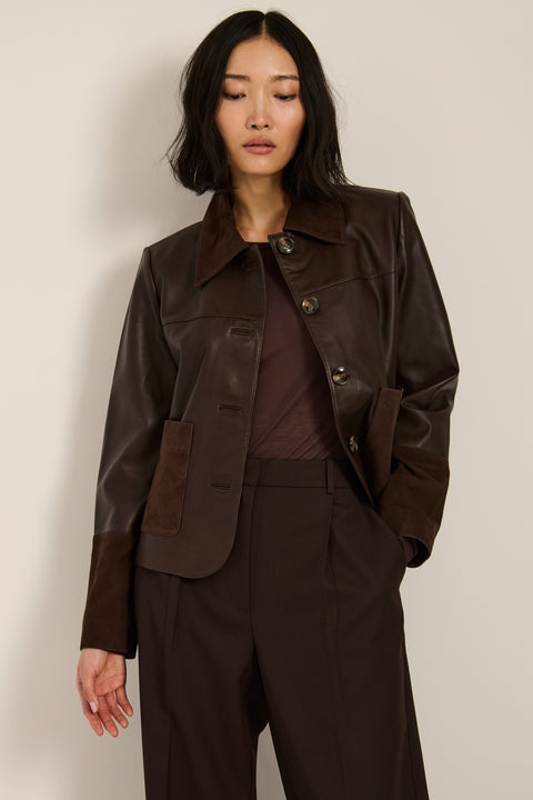 Women's suede and leather barn jacket with utility pockets and stand collar in camel brown