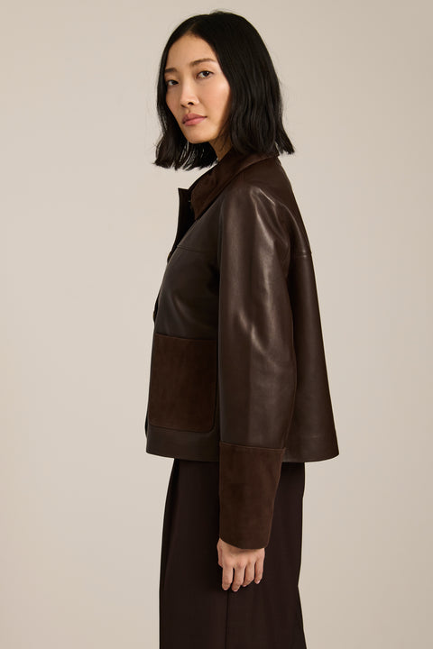 Women's suede and leather barn jacket with utility pockets and stand collar in camel brown