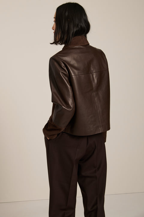 Women's suede and leather barn jacket with utility pockets and stand collar in camel brown