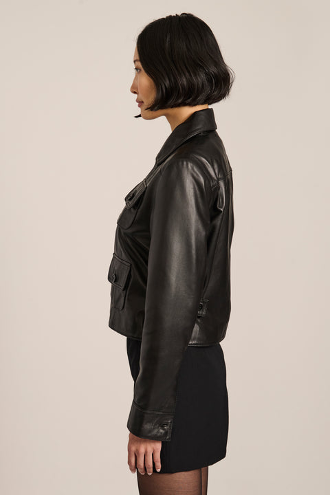 Women's genuine leather utility jacket with button-front closure and four flap pockets