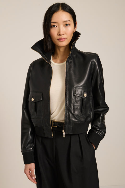 Women's genuine leather bomber jacket with rib-knit trim and utility pockets in black
