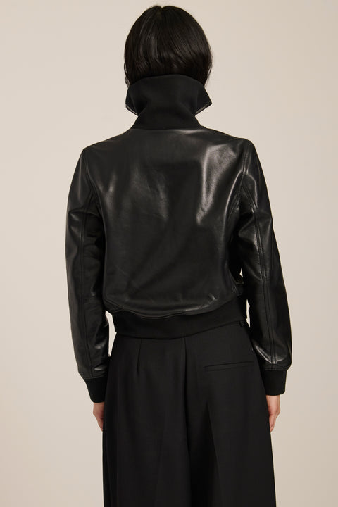 Women's genuine leather bomber jacket with rib-knit trim and utility pockets in black