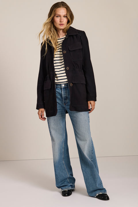 Women's genuine suede safari jacket with adjustable drawcord waist and four patch pockets.