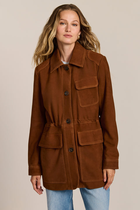 Women's genuine suede safari jacket with adjustable drawcord waist and four patch pockets.