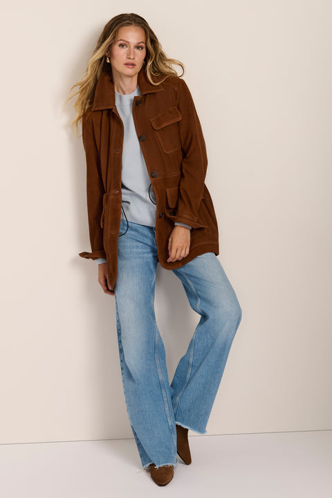 Women's genuine suede safari jacket with adjustable drawcord waist and four patch pockets.
