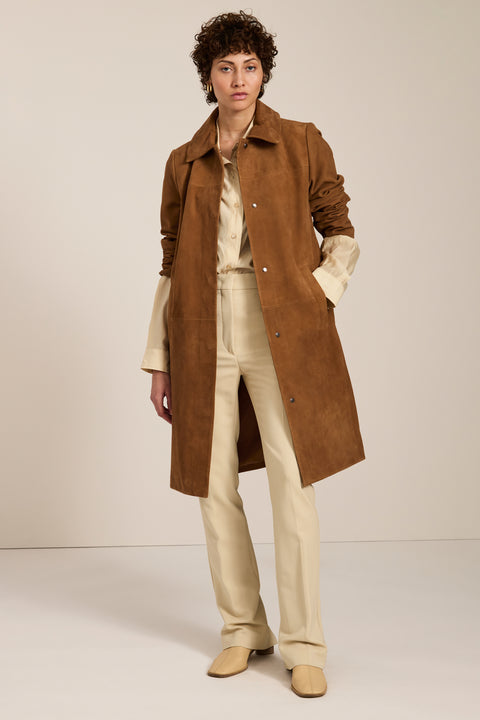Women's genuine suede car coat with concealed button front and classic point collar.