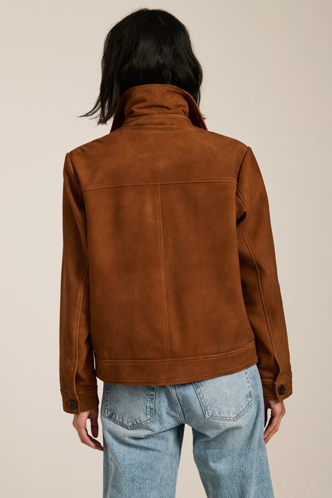 Genuine suede utility jacket with point collar, concealed button-front closure and oversized flap pockets.