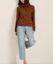 Genuine suede utility jacket with point collar, concealed button-front closure and oversized flap pockets.