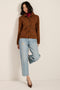 Genuine suede utility jacket with point collar, concealed button-front closure and oversized flap pockets.