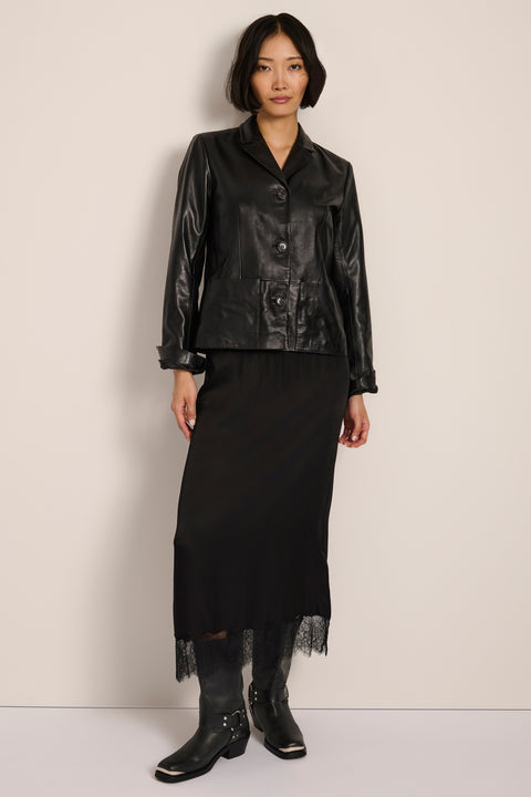 Women's genuine leather blazer with button-front closure and front patch pockets
