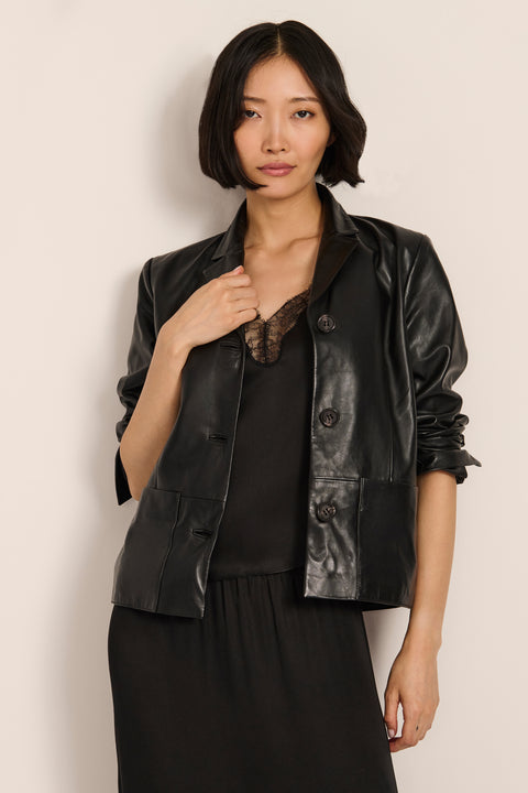 Women's genuine leather blazer with button-front closure and front patch pockets
