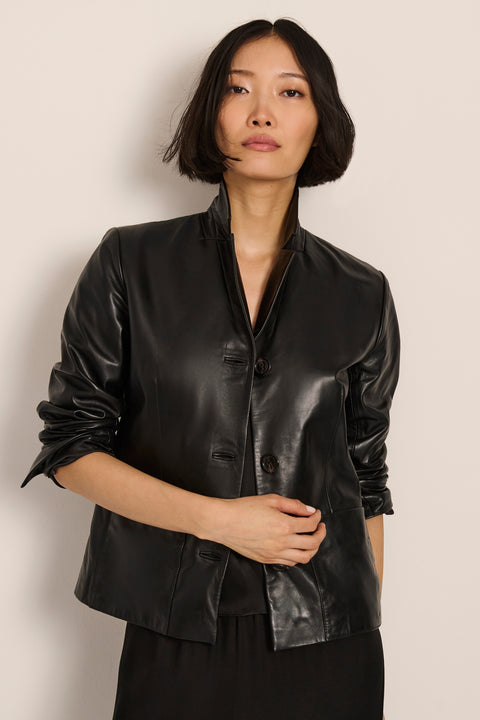 Women's genuine leather blazer with button-front closure and front patch pockets