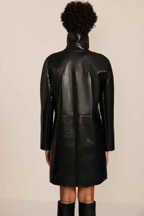 Women's black genuine leather car coat with point collar, button-front closure and side pockets.