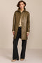 Women's genuine leather car coat with point collar, button-front closure and side pockets.
