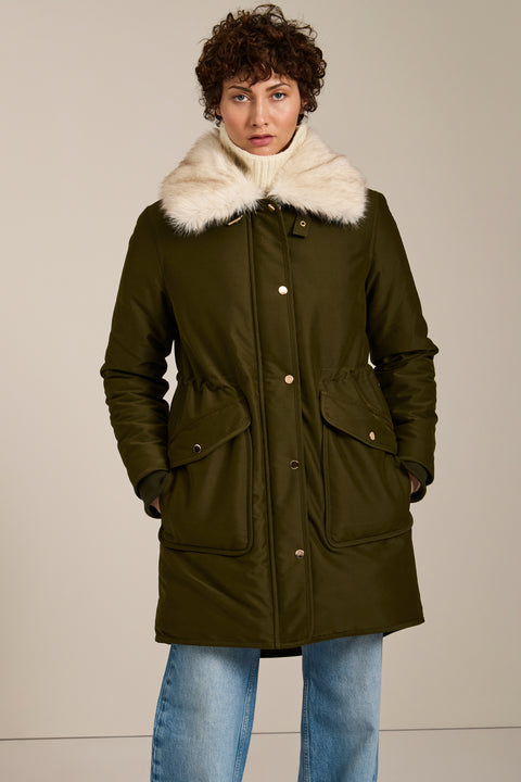 Insulated parka with removable faux fur collar, drawstring waist, oversized utility pockets and hidden zip closure.
