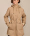 Women's raincoat with drawstring waist and hood.