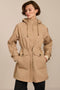 Women's raincoat with drawstring waist and hood.