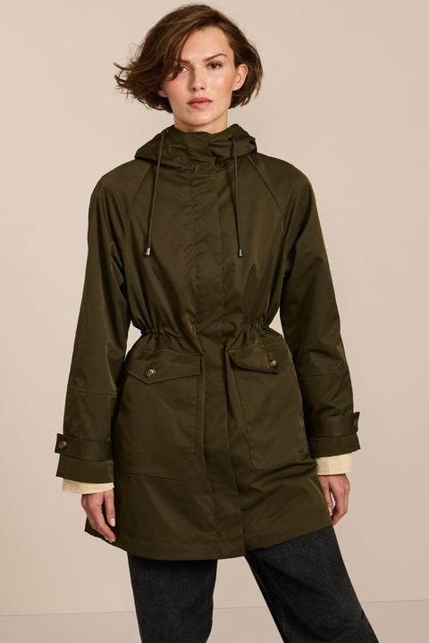 Women's raincoat with drawstring waist and hood.