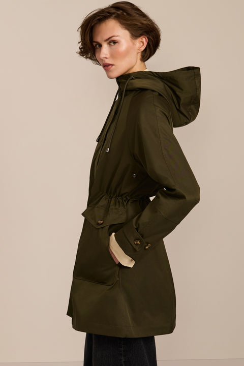 Women's raincoat with drawstring waist and hood.