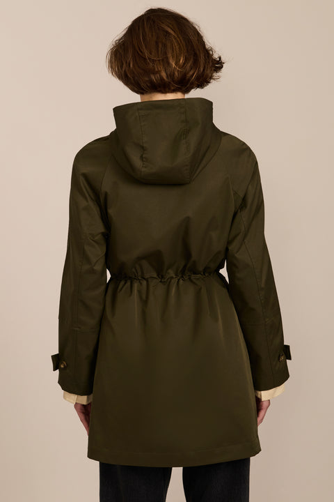 Women's raincoat with drawstring waist and hood.