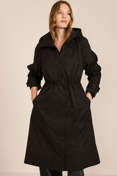 Women's water-repellent hooded raincoat with adjustable drawcord waist and patch pockets