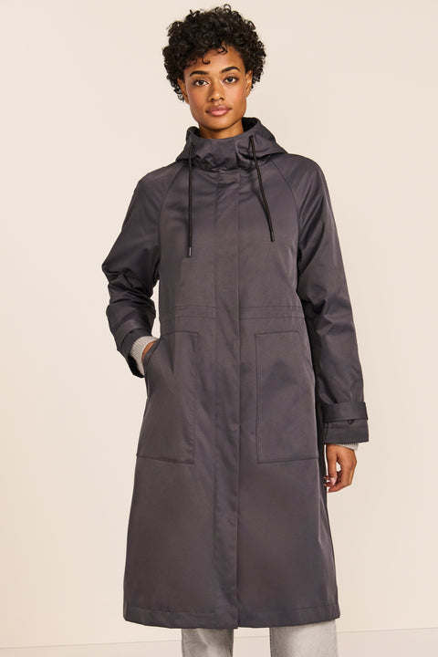 Women's water-repellent hooded raincoat with adjustable drawcord waist and patch pockets