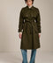 Women's belted trench coat with double-breasted front and water-repellent fabric.