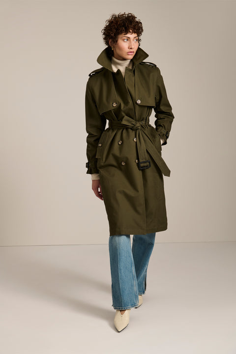 Women's belted trench coat with double-breasted front and water-repellent fabric.
