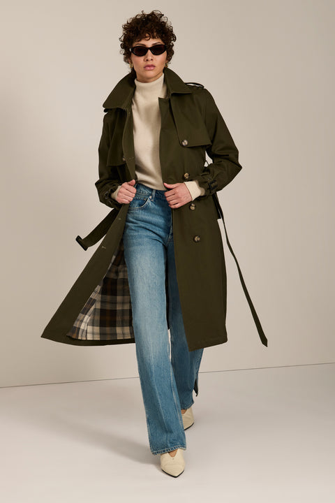 Women's belted trench coat with double-breasted front and water-repellent fabric.