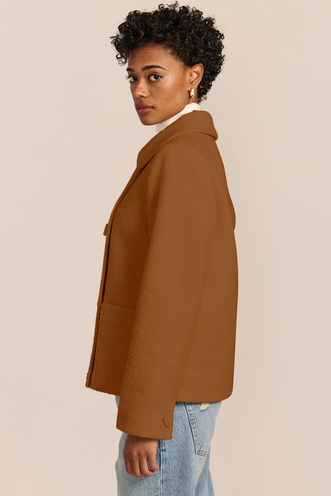 Double-Breasted Bouclé Jacket in camel, with pointed collar and patch pockets.