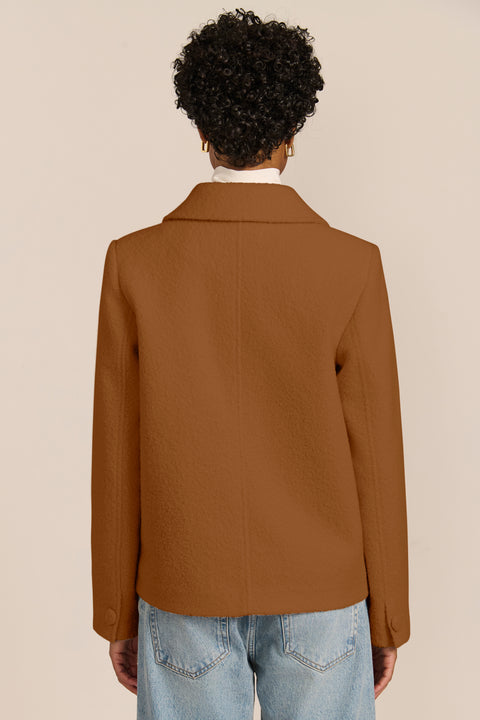 Double-Breasted Bouclé Jacket in camel, with pointed collar and patch pockets.