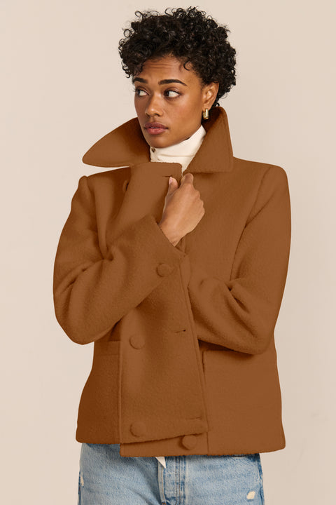 Double-Breasted Bouclé Jacket in camel, with pointed collar and patch pockets.