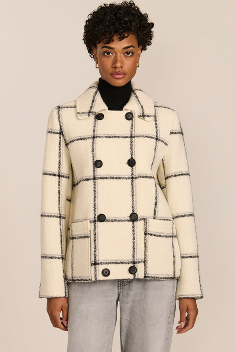 women's Double-Breasted Bouclé Jacket in ivory with a black windowpane pattern, pointed collar and patch pockets.