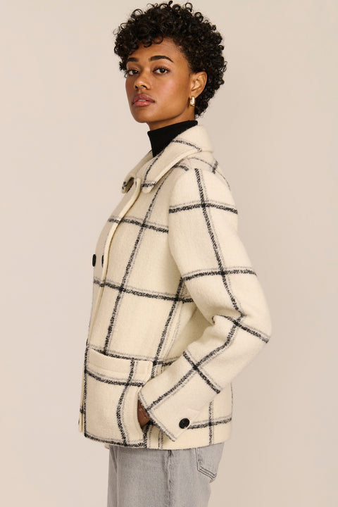 women's Double-Breasted Bouclé Jacket in ivory with a black windowpane pattern, pointed collar and patch pockets.
