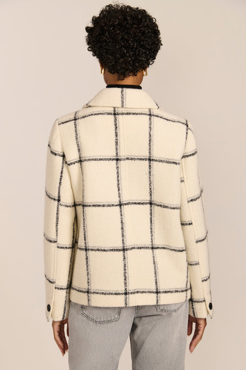 women's Double-Breasted Bouclé Jacket in ivory with a black windowpane pattern, pointed collar and patch pockets.