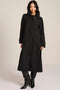 women's long wool coat in black with a sculptural convertible collar, long relaxed silhouette and button-tab cuffs.