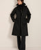 Women's belted raincoat with removable hood and water-repellent finish.