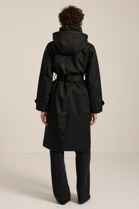 Women's belted raincoat with removable hood and water-repellent finish.