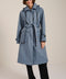 Women's belted raincoat with removable hood and water-repellent finish.