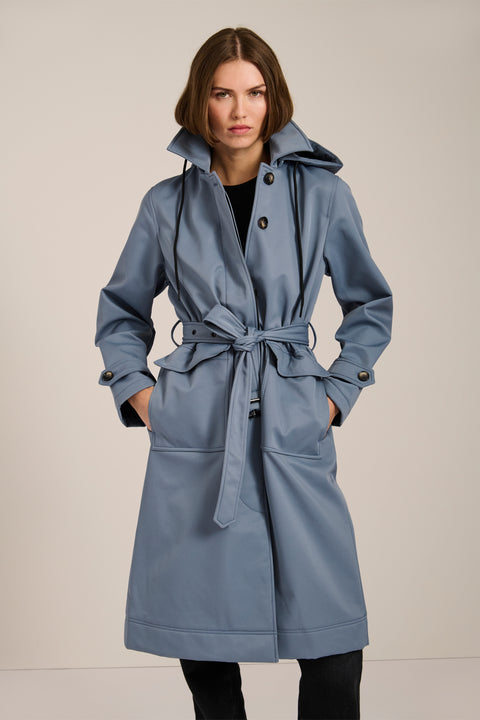 Women's belted raincoat with removable hood and water-repellent finish.