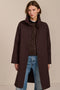 Women's two in one raincoat with removable quilted vest.